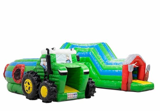 Kruiptunnel tractor springkasteel met obstakals, een klimhelling en glijhelling voor kids bestellen. Koop springkastelen online bij JB Inflatables Nederland