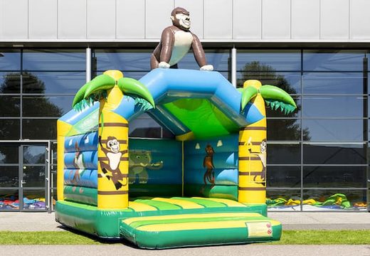 Standaard jungle springkasteel te koop in opvallende kleuren met bovenop een groot gorilla 3D object voor kinderen. Koop overdekt springkasteel online bij JB Inflatables Nederland