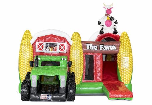 Opblaasbaar springkasteel met glijbaan in boerderij thema met glijbaan in vorm van tractor kopen