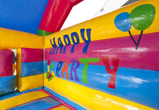 Overdekt multifun luchtkussen met glijbaan in party thema met 3D object op het dak kopen voor kids. Bestel luchtkussens online bij JB Inflatables Nederland