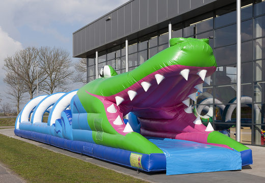 Bestel een perfecte opblaasbare 18meter lange buikschuifbaan in krokodil thema voor kinderen. Koop opblaasbare buikschuifbanen nu online bij JB Inflatables Nederland