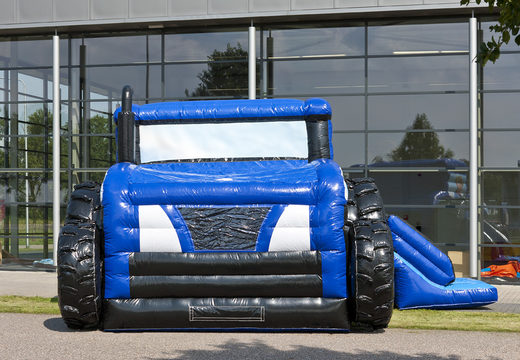 Overdekt maxi multifun springkasteel met glijbaan in blauwe tractor thema bestellen voor kinderen. Koop springkastelen online bij JB Inflatables Nederland