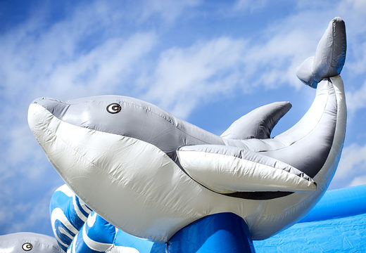 Opblaasbaar overdekt blauw multifun springkussen met glijbaan kopen in thema dolfijn voor kinderen.  Bestel online springkastelen bij JB Inflatables Nederland