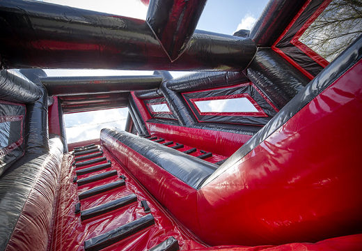 Haal een 40 meter lange opblaasbare rood zwarte mega alligator stormbaan nu online. Koop opblaasbare stormbanen bij JB Promotions Nederland
