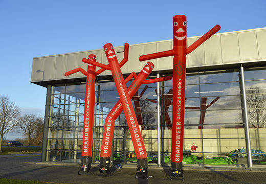 Opblaasbare Brandweer Gelderland midden skydancer in de signaalkleur rood op maat gemaakt bij JB Promotions Nederland; specialist in opblaasbare reclame artikelen zoals inflatable tubes