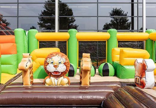 Gekleurde inflatable park in jungle thema bestellen voor kinderen. Koop springkussens online bij JB Inflatables Nederland 