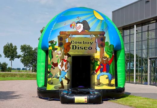  Multi-thema 4,5 meter springkasteel te koop in thema Cowboy voor kinderen. Bestel online opblaasbare sprinkastelen bij JB Inflatables Nederland