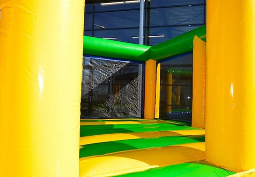 Groot opblaasbaar open multiplay indoor standaard springkasteel met glijbaan bestellen voor kids. Koop springkastelen online bij JB Inflatables Nederland
