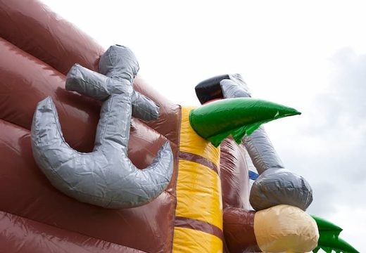Springkasteel in thema piratenboot met een glijbaan en 3D objecten kopen voor kinderen. Bestel springkastelen online bij JB Inflatables Nederland