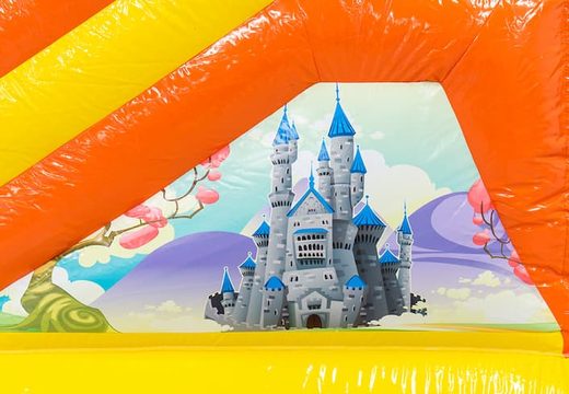 Opblaasbaar springkussen met glijbaan in fairy wonderland thema kopen voor kinderen. Bestel opblaasbare springkussens online at JB Inflatables Nederland 