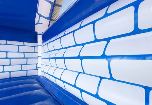 Groot overdekt blauw wit springkussen kopen in thema kasteel voor kinderen. Bestel springkussens online bij JB Inflatables Nederland 