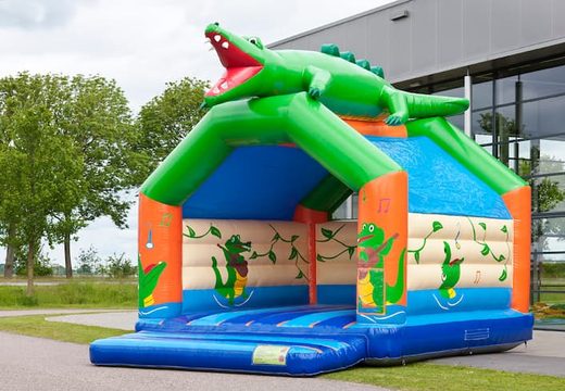 Super springkasteel overdekt kopen in krokodil thema voor kinderen. Koop springkastelen online bij JB Inflatables Nederland