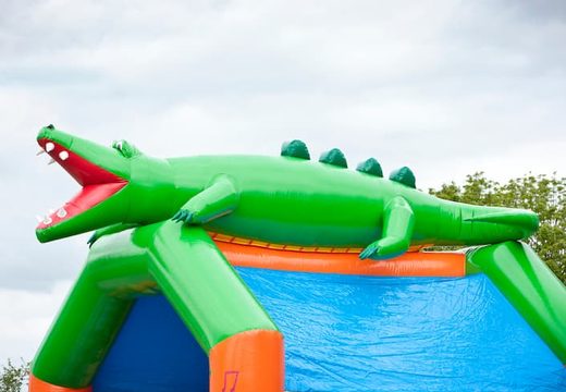 Groot springkasteel overdekt kopen in thema krokodil voor kinderen. Koop springkastelen online bij JB Inflatables Nederland 