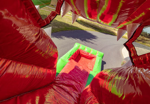 Bestel inflatable multiplay super dino thema met spring gedeelte en glijbaan voor kinderen