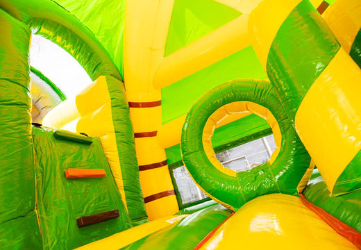 Inflatable multiplay groot springkasteel met glijbaan in jungle thema kopen voor kinderen