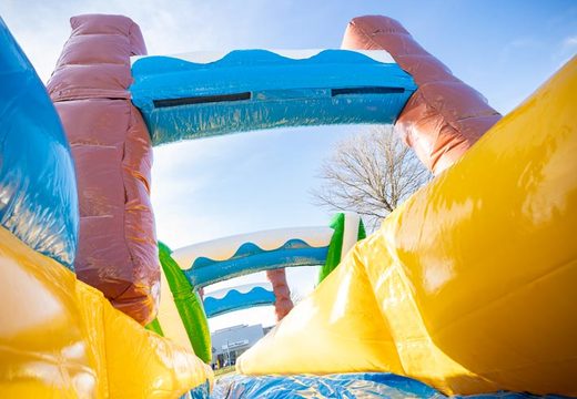 Waterglijbaan in thema Hawaii kopen voor kinderen. Bestel Drop and Slide nu online bij JB Inflatables Nederland