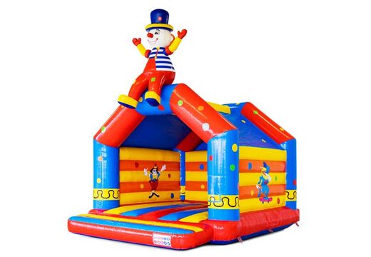 Rood, blauw, geel en circus thema met clown springkasteel
