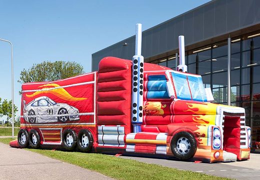 Inflatable bouncer with truck theme in red color